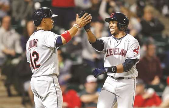 Cleveland Indians right fielder Greg Allen (right) is congratulated by shortstop Francisco Lindor after hitting two-run home run off Chicago White Sox relief pitcher Jace Fry (not pictured) during the seventh inning at Guaranteed Rate Field. PICTURE: USA TODAY Sports