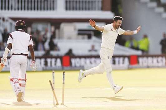 Englandu2019s James Anderson celebrates the wicket of West Indiesu2019 Kraigg Brathwaite, his 500th Test wicket, on second day of the third Test at the Lordu2019s cricket ground in London yesterday. (Reuters)