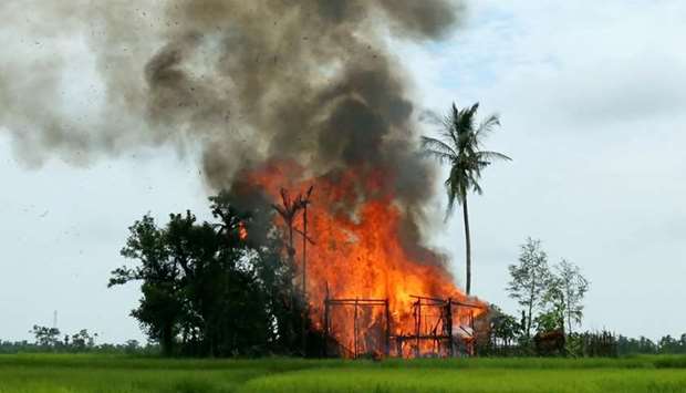 A house is seen on fire in Gawduthar village, Maungdaw township, in the north of Rakhine state, Myanmar September 7, 2017.