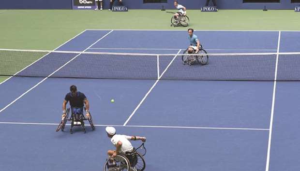 Wheelchair tennis action from the Arthur Ashe Stadium.