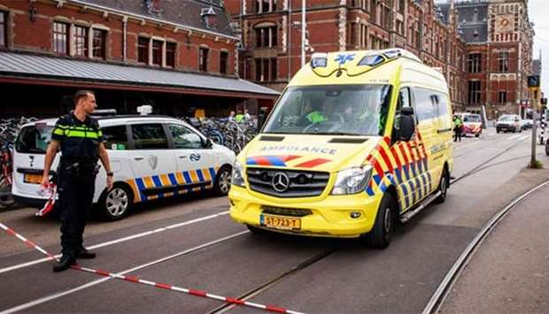 Police at work after a stabbing incident at Amsterdam's Central Station.