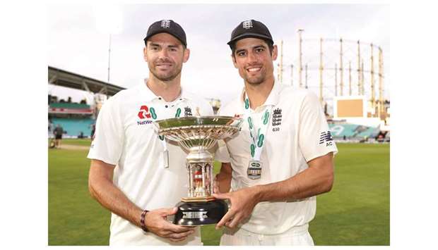 Englandu2019s retiring star Alastair Cook (R) and James Anderson celebrate after the match yesterday.