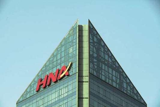 HNA building in Beijing. HNAu2019s debt, one of the highest among Chinese companies, declined for the first time after the embattled conglomerate reversed a multi-year acquisition spree by selling off dozens of assets to stay in business.