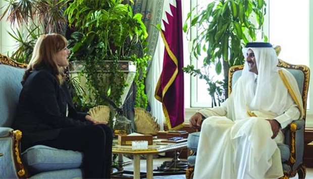 His Highness the Amir Sheikh Tamim bin Hamad al-Thani with the new ambassador of Canada Stefanie McCollum.