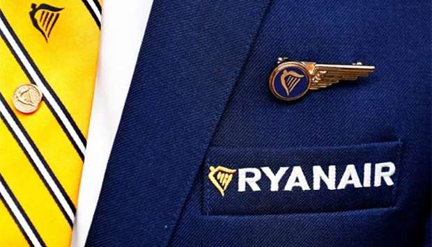 Ryanair logo is pictured on the the jacket of a cabin crew member ahead of a news conference by Ryanair union representatives in Brussels on Thursday.