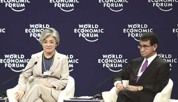 South Koreau2019s Foreign Minister Kang Kyung-wha, (left) and Japanu2019s Foreign Minister Taro Kono, attend a panel discussion at the World Economic Forum on Asean at the National Convention Center in Hanoi yesterday.