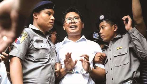 Reuters journalists Wa Lone in custody in Myanmar.