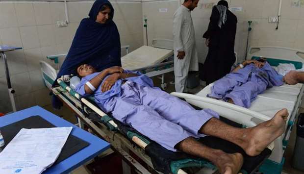 Afghan victims receive treatment at a hospital the day after a suicide attack targeting protesters in Mohmand Dara district of Nangarhar Province, in Jalalabad on Wednesday. AFP