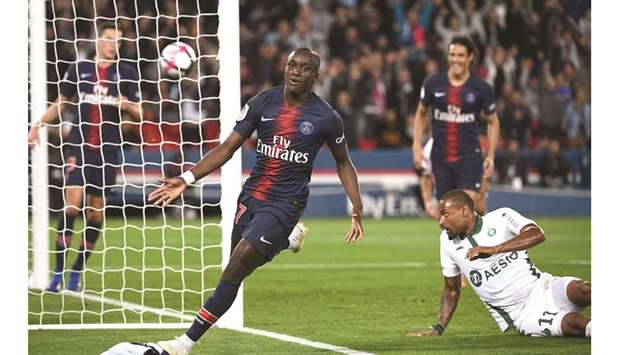 Paris Saint-Germainu2019s Moussa Diaby (left) celebrates after scoring a goal during the Ligue 1 match against Saint-Etienne at the Parc des Princes stadium in Paris on Friday. (AFP)
