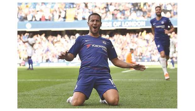 Chelseau2019s Eden Hazard celebrates his goal during the English Premier League match against Cardiff City at Stamford Bridge in London yesterday. (AFP)