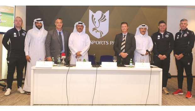 Moreland with DGC General Manager Gary McGlinchey, Qatar Golf Association General Secretary Fahad al-Naimi and other officials.