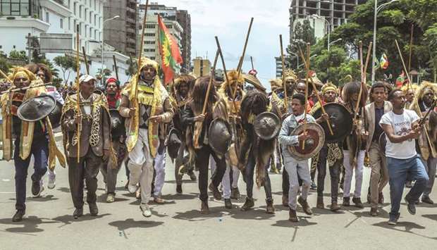 People gather to celebrate the return of the formerly banned anti-government group the Oromo Liberation Front at Mesquel Square in the Ethiopian capital Addis Ababa.