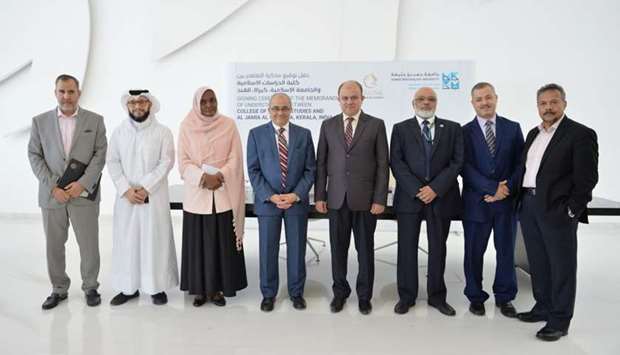 HBKU and Al Jamia Al Islamiya officials at the signing ceremony