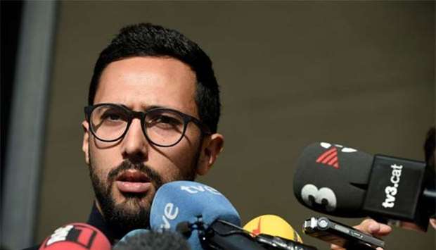Spanish rapper Jose Miguel Arenas Beltran, better known as Valtonyc, answers journalists questions after Belgian justice refused his extradition to Spain, at the Justice Palace in Ghent on Monday.