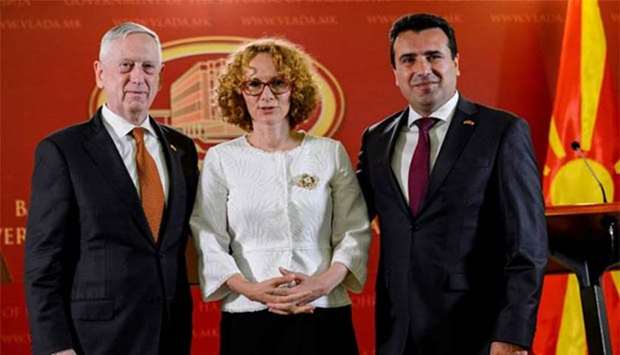 US Defense Secretary James Mattis, Macedonia's Defence Minister Radmila Sekerinska and Macedonian Prime Minister Zoran Zaev pose after a joint press conference in Skopje on Monday.