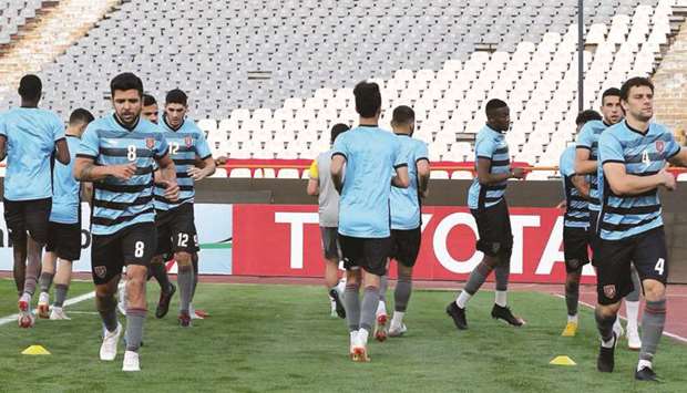 Al Duhail players take part in a training session at Azadi Stadium in Tehran yesterday. (Twitter/DuhailSC)