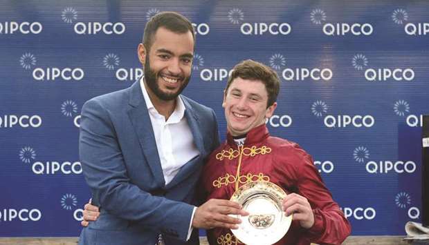 Sheikh Fahad al-Thani with jockey Oisin Murphy after he rode Roaring Lion to victory on Saturday.