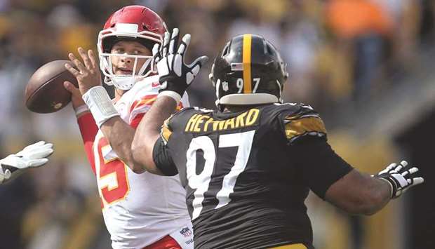 Kansas City Chiefs quarterback Patrick Mahomes passes against Pittsburgh Steelers defensive tackle Cameron Heyward during the fourth quarter of their NFL game at Heinz Field. PICTURE: USA TODAY Sports
