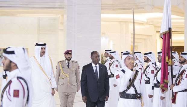 His Highness the Amir Sheikh Tamim bin Hamad al-Thani and Cote d'Ivoire President Alassane Ouattara at the official reception.