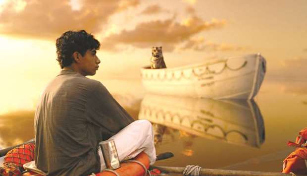 Pi (Suraj Sharma) and a Bengal tiger known as Richard Parker arrive at an uneasy du00e9tente in director Ang Leeu2019s Life of Pi.