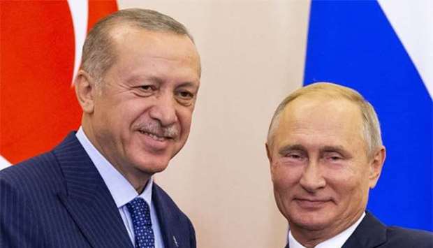 Russian President Vladimir Putin and his Turkish counterpart Tayyip Erdogan attend a news conference following their talks in Sochi on Monday.