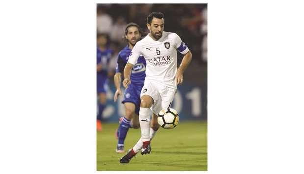 Al Saddu2019s Spanish star Xavi in action during the AFC Champions League quarter-final against Esteghlal at the Jassim Bin Hamad Stadium in Doha on Monday.