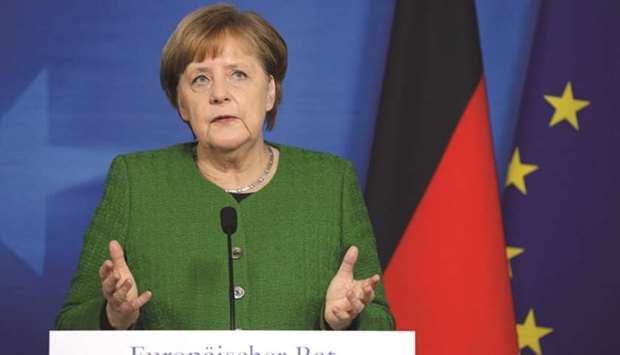 Merkel: defends immigration plans