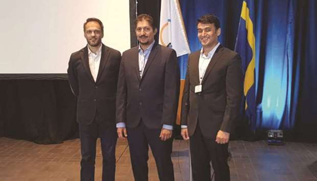 Fuad al-Mudahka (centre) with other representatives from the 3-2-1 Qatar Olympic and Sports Museum at the 13th General Assembly of The Olympic Museums Network.