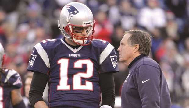 New England Patriots coach Bill Belichick (right) with star quarterback Tom Brady.