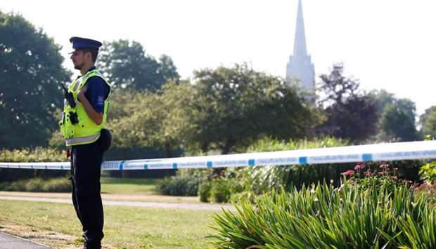 A police officer guards a cordoned off area of Queen Elizabeth Gardens, after it was confirmed that two people had been poisoned with the nerve-agent Novichok, in Salisbury, Britain, July 5, 2018