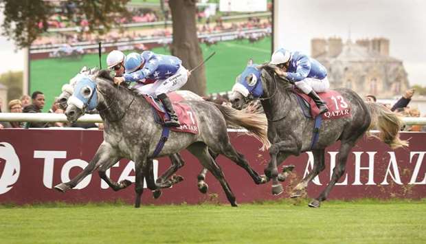 Jockey Maxime Guyon (centre) rides Gazwan to victory in the 2017 edition of Qatar Arabian World Cup in Chantilly, France.