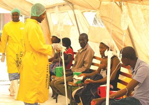 Patients are treated at a clinic dealing with cholera outbreak in Harare.
