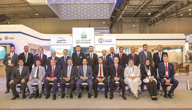 Qatar delegation pose for a photograph at Gastech, which will conclude in Barcelona today.
