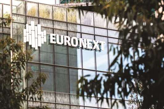 The Euronext logo is seen on the exterior of the Paris Stock Exchange. The CAC 40 finished trading 1.1% higher at 5,451.59 points yesterday.