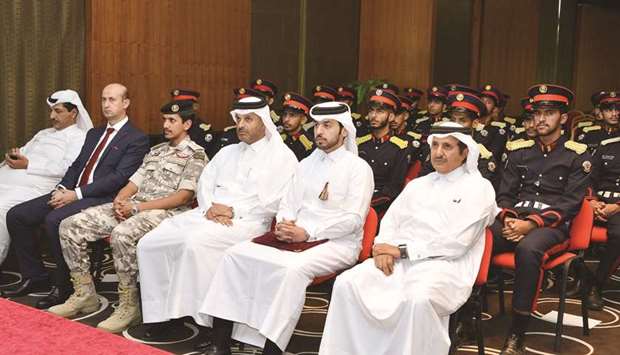 Qatar Chamber chairman Sheikh Khalifa bin Jassim al-Thani and Qicca board member for international relations Sheikh Dr Thani bin Ali al-Thani join lawyers, arbitrators, and students from Ahmed bin Mohamed Military College during a seminar held at Qatar Chamber yesterday.