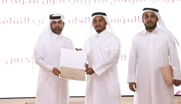 Dr Khalid bin Ibrahim al-Sulaiti honours graduates at a ceremony.
