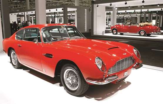 A 1966 Aston Martin DB6 coupe is displayed during a media preview of the newly launched Grand Basel autoshow in Basel on September 4, 2018. The part-flotation of Aston Martin u2013 whose top-end cars are cherished by Hollywood actors, global sports stars and British royalty u2013 will carry a price range of u00a317.50 to u00a322.50 per share.