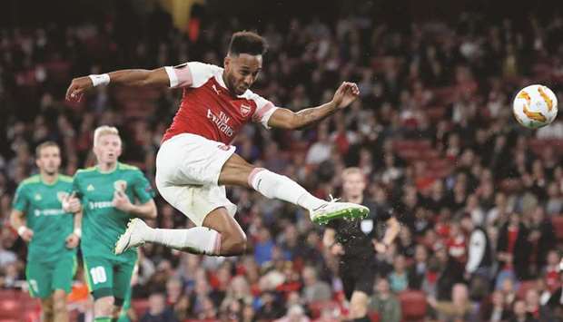 Arsenalu2019s Pierre-Emerick Aubameyang has a shot at goal during the Europa League Group E match against FC Vorskla Poltava of Ukraine in London on Thursday. (Reuters)