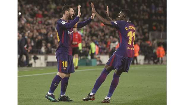 Barcelonau2019s Lionel Messi (left) and Ousmane Dembele. (Reuters)