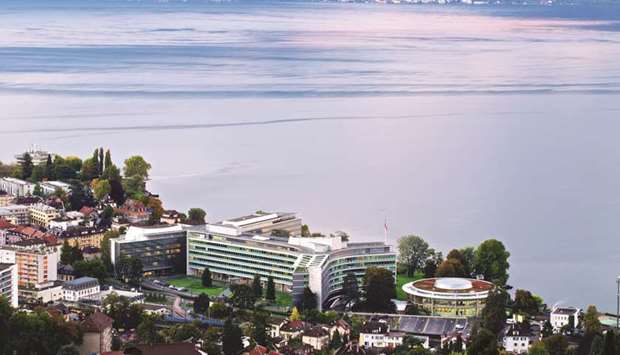 The headquarters of Nestle stands surrounded by residential apartment blocks on the banks of Lake Geneva in Vevey, Switzerland. Nestle said it would consider new owners for its dermatological business, a unit with $2.8bn in annual revenue.