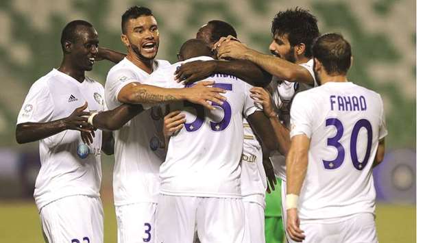 Al Sailiya players celebrate their victory over Al Ahli in the QNB Stars League yesterday.