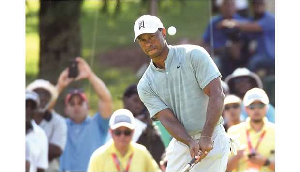 Tiger Woods chips on the 11th green during the second round of the Tour Championship in Atlanta, Georgia, on Friday. (USA TODAY Sports)