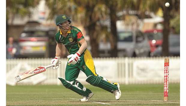 Randwick-Petershamu2019s David Warner plays a shot during a domestic cricket match against St George at Coogee Oval in Coogee, a suburb in Sydney, yesterday. (AFP)