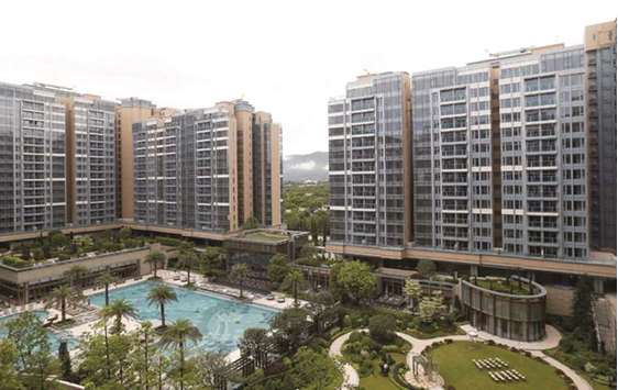 Newly built Park Yoho Genrova by major developer Sun Hung Kai Properties is seen in Hong Kong. Hong Kongu2019s housing market has shown signs of u201ccooling off in the past two weeksu201d as downside risks increase, with borrowing costs in the city likely to rise this month in line with the US Federal Reserveu2019s upward trajectory, Financial Secretary Paul Chan said.