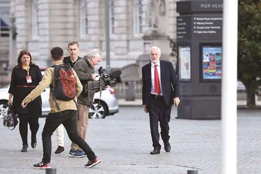 Labour leader Jeremy Corbyn arrives to give an interview to the BBC at the Museum of Liverpool yesterday, the official opening day of the annual Labour Party Conference.