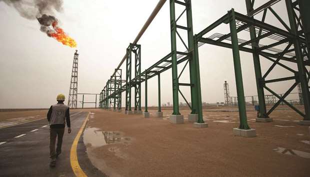 An employee walks near a degassing facility inside the Zubair oil and gas field, north of the southern Iraqi province of Basra. Southern Iraqi exports in the first 19 days of September averaged 3.6mn bpd, according to ship-tracking data compiled by an industry source, up 20,000 bpd from Augustu2019s 3.58mn bpd u2014 the existing monthly record.