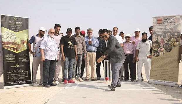 Zaffran Cafu00e9 Business Development manager Siddiq Fahad inaugurates the Zaffran Cafe Cricket Tournament 2018 in presence Qatar Veterans Cricket officials, players and match officials at the West Bay Cricket Complex.