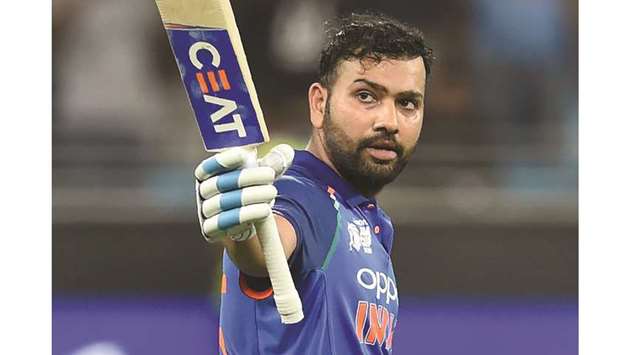 Indiau2019s Rohit Sharma  celebrate after scoring their respective centuries during the Asia Cup Super Four match against Pakistan at the Dubai International Cricket Stadium in Dubai yesterday. (AFP)