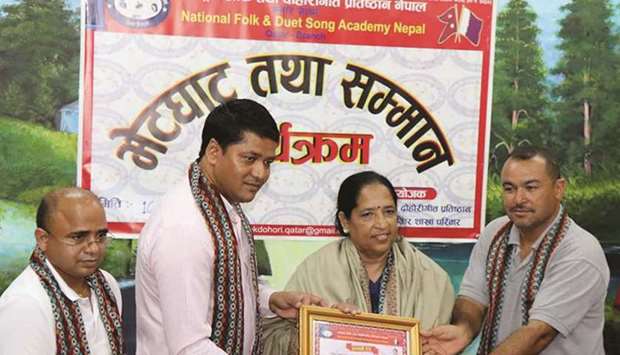 HONOURED: National Folk and Duet Song Academy Qatar recently honoured Koirala during an event.