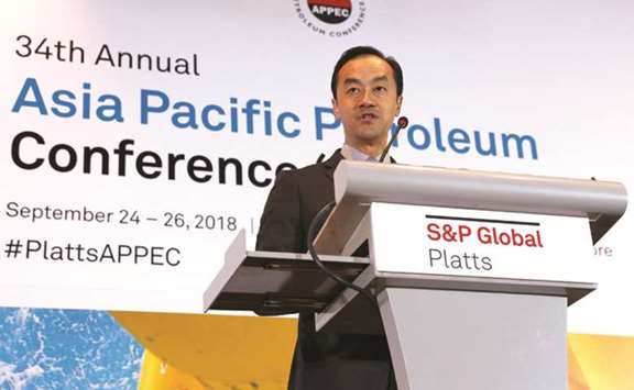 Singaporeu2019s Minister of Trade and Industry Koh Poh Koon speaks at the 34th Asia Pacific Petroleum Conference in Singapore yesterday. Oil prices could rise towards $100 per barrel towards the end of the year or by early 2019 as sanctions against Iran bite, commodity merchants Trafigura and Mercuria said yesterday.